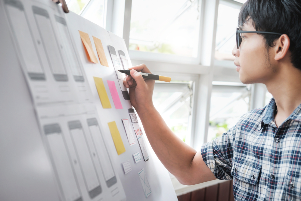 Man generating an idea for his work