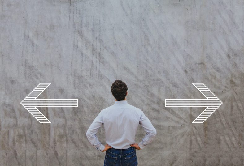 person in the middle of 2 arrows - left or right