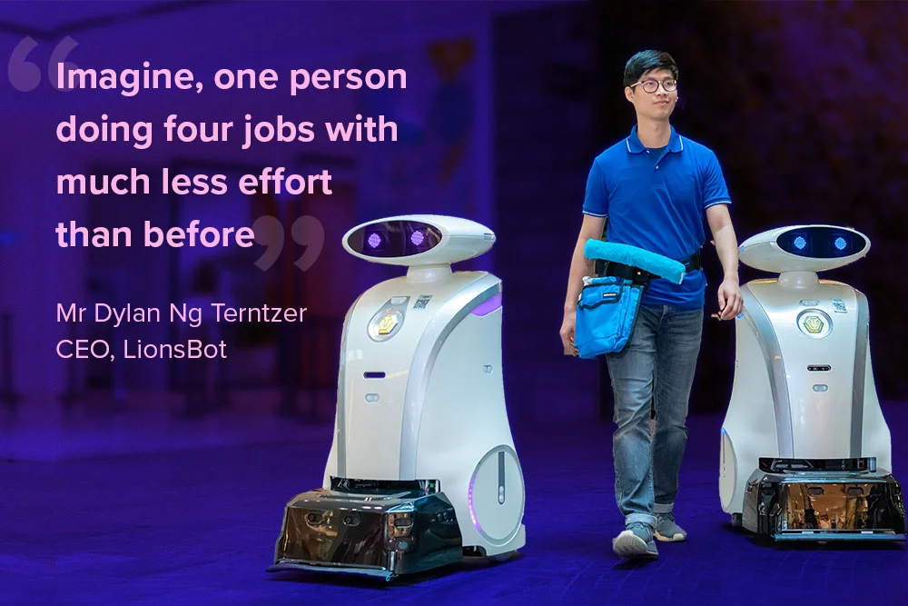 Artificial intelligence in companies visual, a man with robots