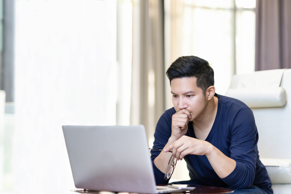 A guy trying to write an email