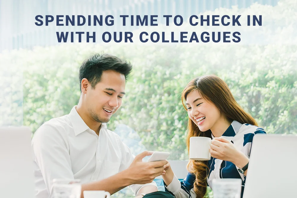 Two colleagues spending time to check in on each other