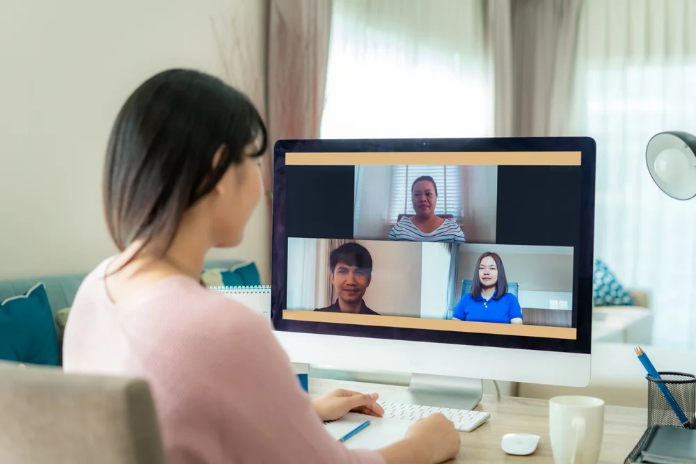 remote team video call with diverse professionals working from home