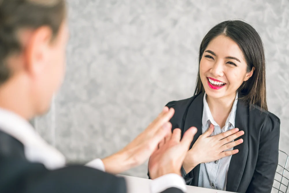 a female employee showing gratitude in workplace