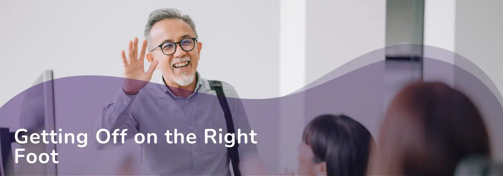 Senior male worker waving - getting off on the right foot