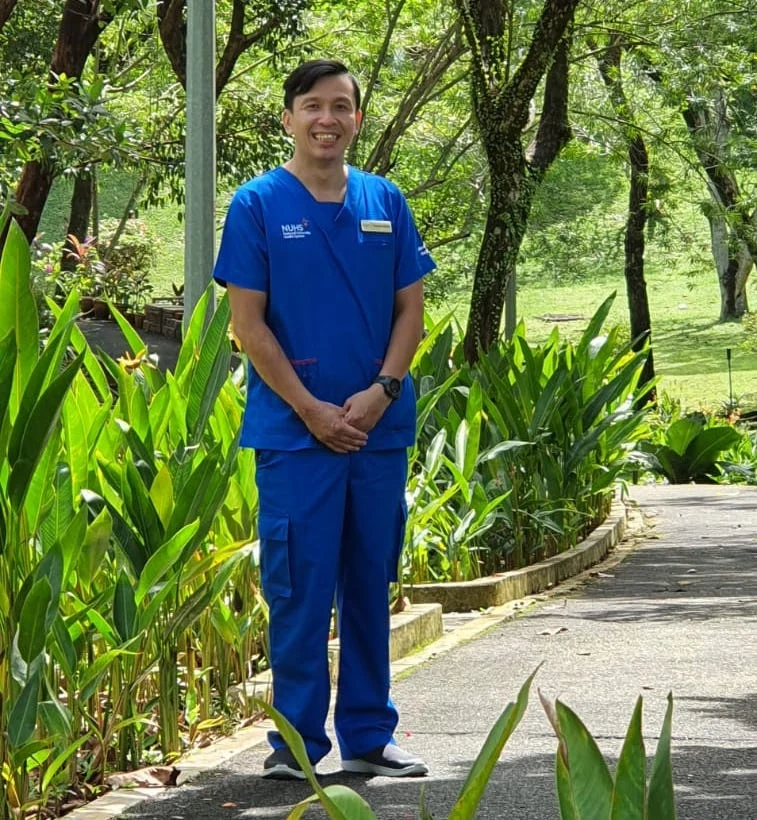 Kelvin Chong, Singapore healthcare worker standing outdoors