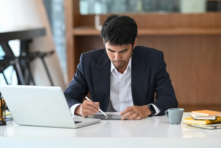 Event planner organizing schedule with sticky notes