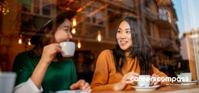two coworkers having coffee together