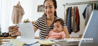 a mother with a baby working from home