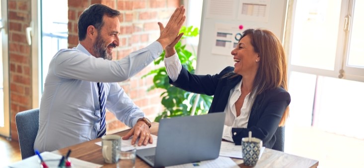 Emloyees applying their communication skills at the workplace