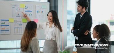 Employees applying their communication skills in a work discussion