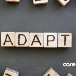 wooden blocks that spell out the word "adapt"