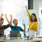 coworkers celebrating in the office