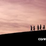 A guide leading a team towards career growth