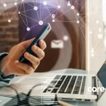 Hiring manager using AI in Recruitment working on their laptop